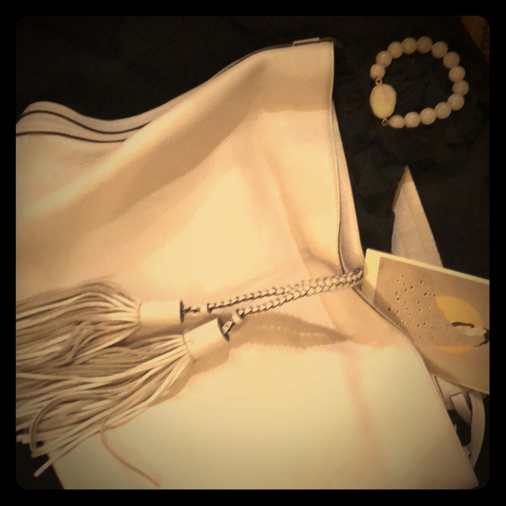 Rebecca Minkoff trending in light lilac A BEAUTY